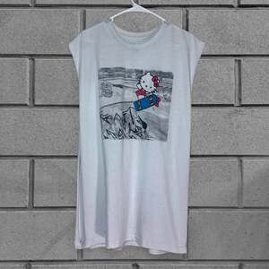Y2K Hello Kitty by Sanrio Skater Graphic Muscle Tee